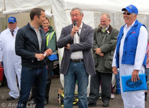 Nick Mason making a speech. From left to right: Kev Roberts, Beaulieu Commentator and another member of staff, Nick Mason, The Managing Director of Beaulieu and Brian Taylor.